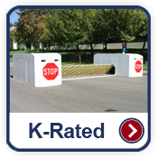 K-Rated gallery button image. Cedar Rapids fencing company commercial fencing contractors Iowa hydraulic bollards wedge cable barrier barrier arm gate K-Rated M50 M30 K4 K8 K12 concertina wire razor wire chain link infrared detection microwave detection barbwire prison correctional airport manufacturing vehicle restraint system vehicle testing hydraulic bollards crash cantilever gate mobile vehicle barrier crash rated