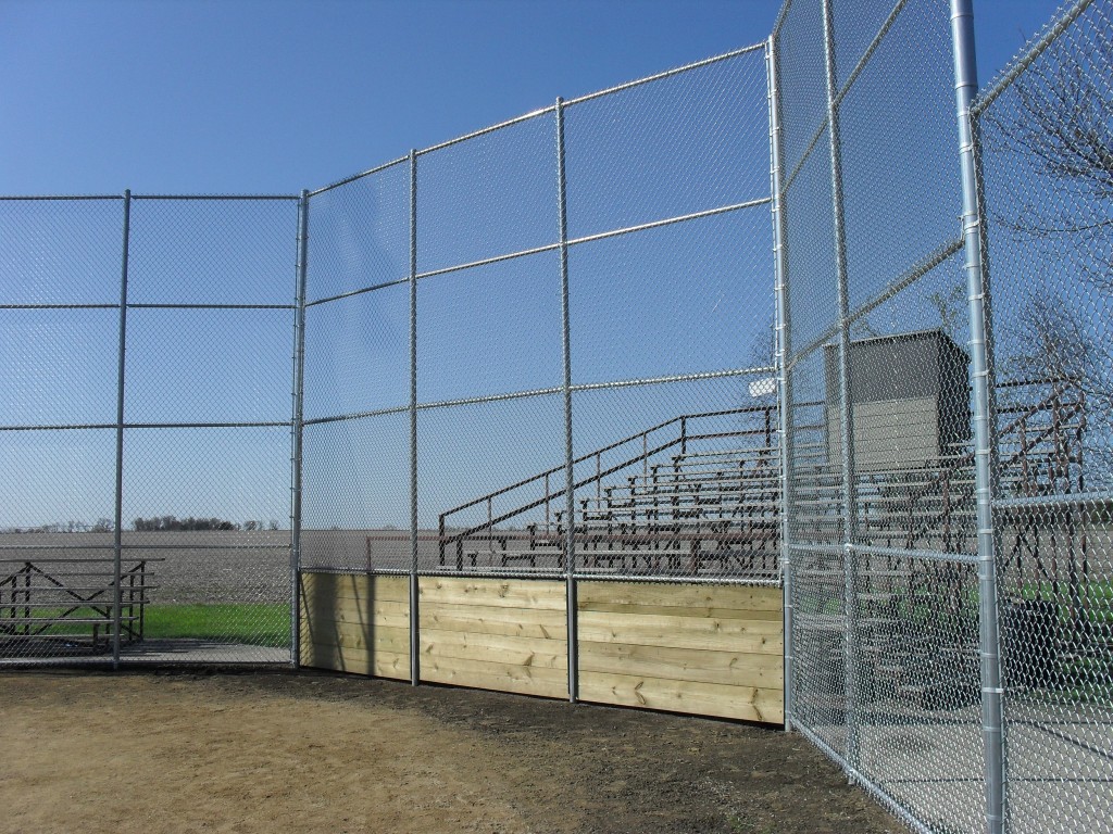 Cedar Rapids fence company commercial fencing contractors Nebraska ballfield baseball field softball field football field complex pickle ball courts basketball tennis courts track peewee elementary junior high high school college professional community chain link wood ornamental backstop dugouts outfield batter's eye