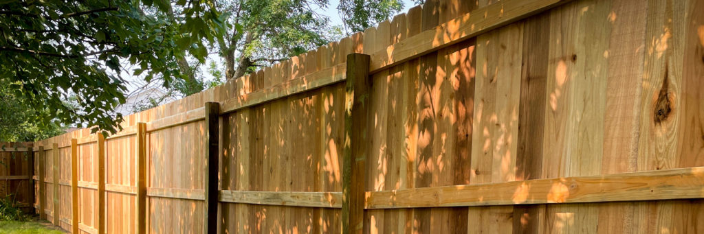 Cedar Rapids fence contractors residential fencing company Iowa wood fence cedar western red cedar treated pine white red yellow CCA  ACQ2 incense fir 2x4 1x6 2" x 4"  1" x 6"  nails stain solid privacy picket scalloped board on board shadow box pickets rails posts installation panels post caps modern horizontal backyard front yard ranch gate garden diy split rail house lattice old rustic vertical metal post picket dog ear contemporary custom